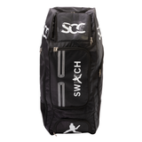 A black cricket duffel bag with white branding, including 'SCC' on the top pocket, 'SWITCH' with a cricket player silhouette on the front, and a cricket player logo on the bottom pocket, shown against a plain white background.